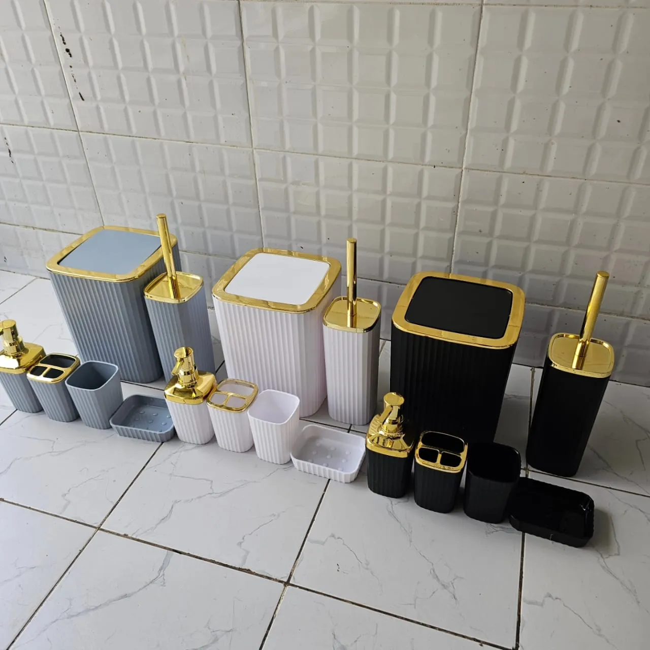 6 in 1 bathroom accessories set with gold ring.